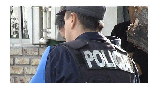 policia espalda