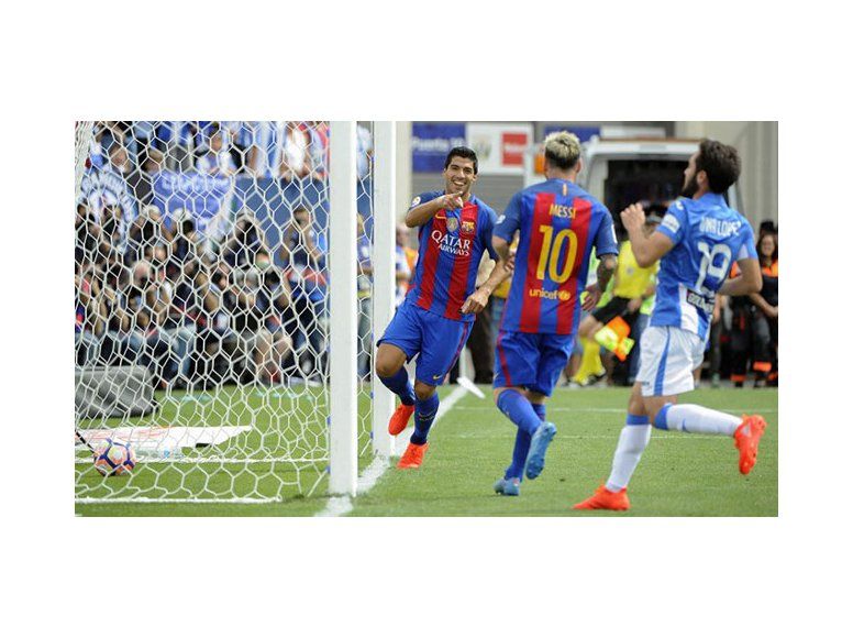 suarez messi barcelona AFP