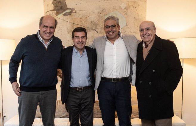 Foto: Amorín, Talvi, Silva y Sanguinetti en la cuestionada reunión del domingo.