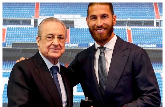 Abrazo protocolar con Florentino. Ambos están distanciados desde enero. Pero juntos lo ganaron todo
