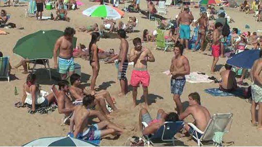 turistas en playa