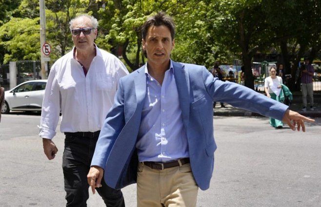 Gustavo Olmos (izquierda) y Diego Camaño, su abogado.