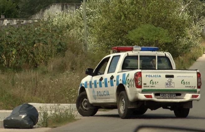 policia-patrullero-camino.jpg