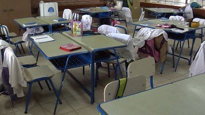 el 87% de los ninos de la escuela publica concurren todos los dias a clase