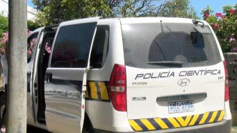 Cuando la Policía llegó a la cabaña, los observó tirados al fondo del terreno.