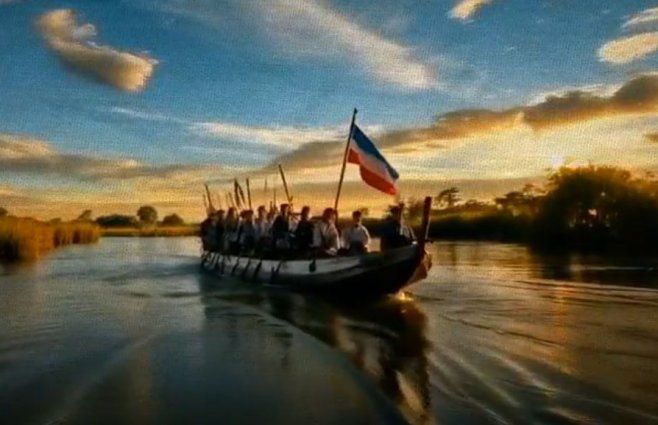 Recreación con IA del desembarco de los 33 Orientales con la bandera de Libertad o Muerte. Imagen: Presidencia de la República.