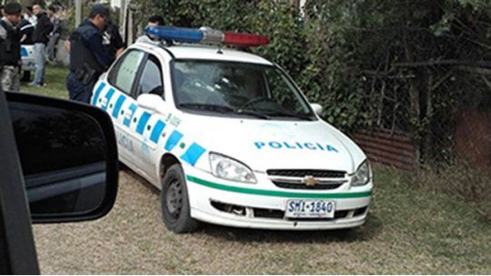 policía auto