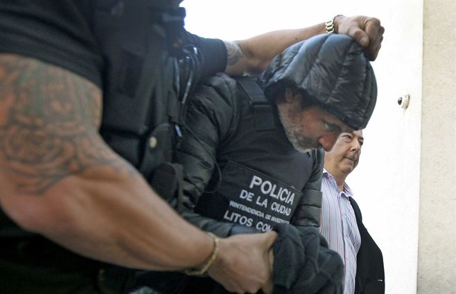 Baratta llevado por la Policía a los tribunales de Comodoro Py.