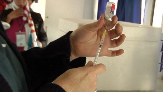 vacuna gripe jeringa