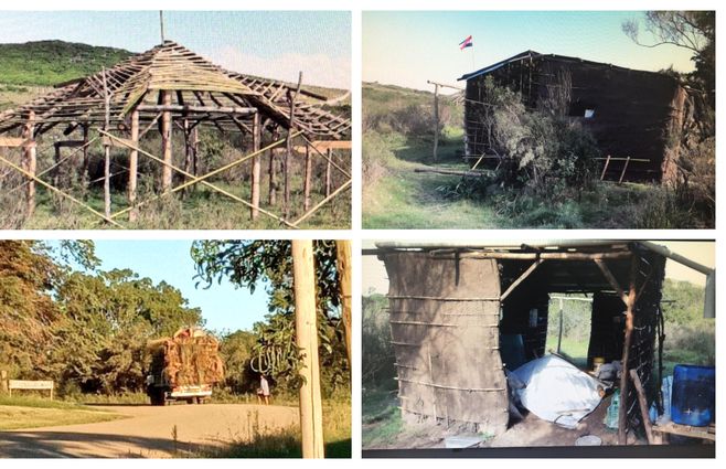 Camiones con materiales de construcción para las ocupaciones. Una de las casas tiene la bandera de Otorgués
