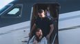 Foto: AFP. Flávio Bolsonaro baja del avión en Miami, EEUU.