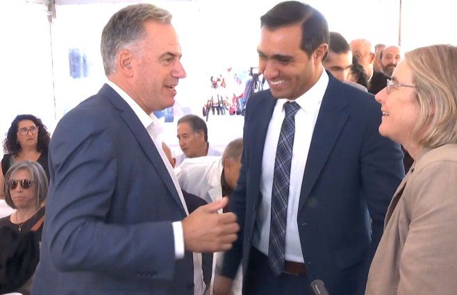 El presidente Orsi con el exministro de Salud José Luis Satdjián. 
