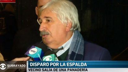 vecino salia de una panaderia, recibio un balazo por la espalda y murio durante un tiroteo
