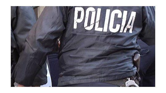 policia espalda