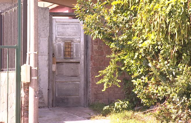 puerta disparos