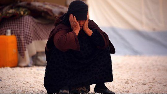 mujer raqa siria